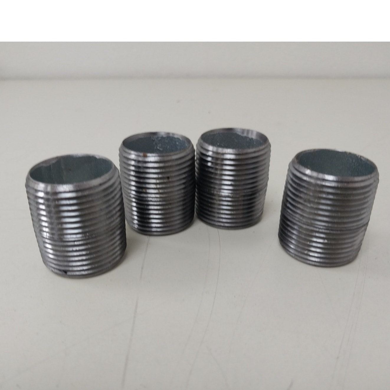 4 New 1.25" by 1.5" Threaded Steel Close Pipe Nipples New Without Original Package